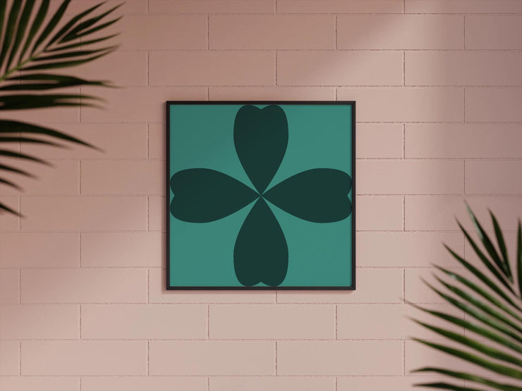 Abstract Cloverleaf Wall Art featuring a green design on a wall surrounded by indoor plants