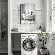 Charming Penguin Bath Time Wall Art in a Modern Bathroom Setting with a Washer and Towels