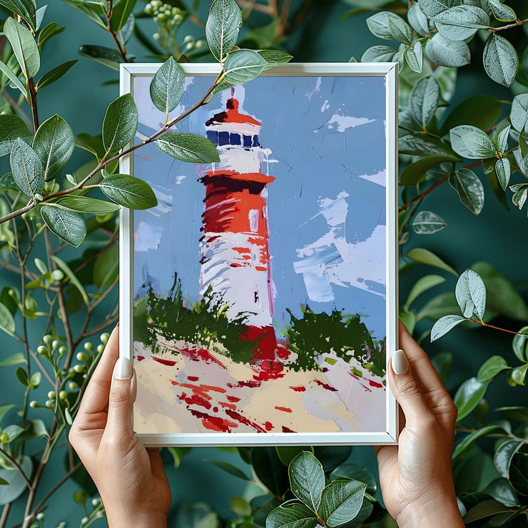 Coastal Lighthouse Art poster Print in a white frame, surrounded by lush greenery