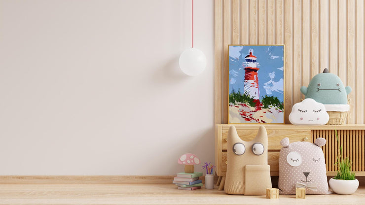 Coastal Lighthouse Art poster Print displayed in a modern room with plush toys and wooden decor