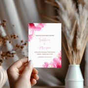 Floral Pink Wedding Invitation Template featuring delicate pink flowers and elegant typography