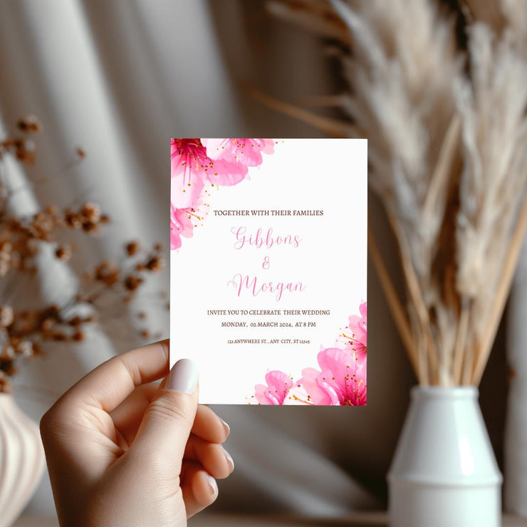 Floral Pink Wedding Invitation Template featuring delicate pink flowers and elegant typography