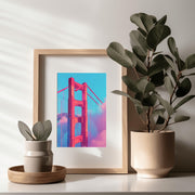 Golden Gate Bridge pink wall art in a modern frame with plants for stylish home decor