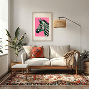 Zebra Print on Pink Background Poster Framed and Displayed in a Modern Living Room Setting